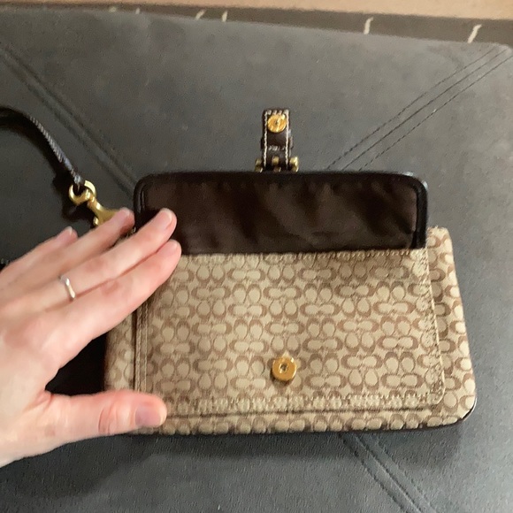 Brown Coach clutch purse with leather strap. - Picture 4 of 4